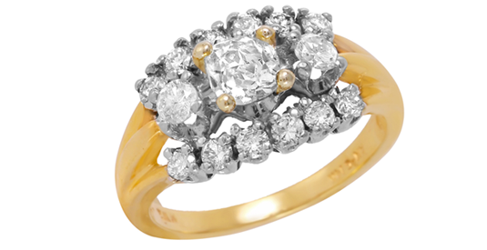 Closeup image of a multi-stone diamond ring with a gold band.