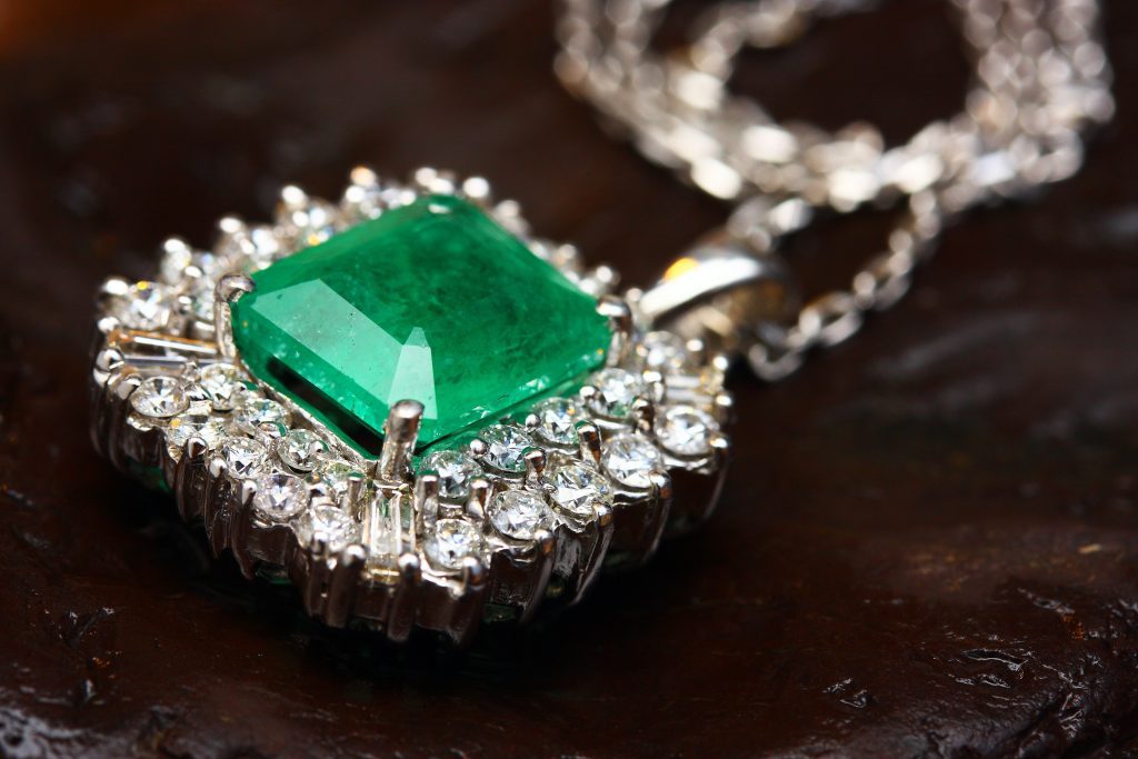 Image of an emerald and diamond necklace.