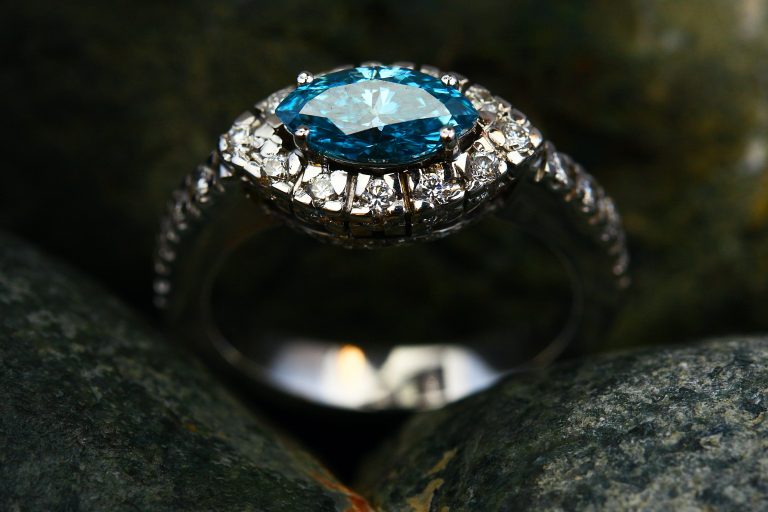 Image of a blue precious gem ring