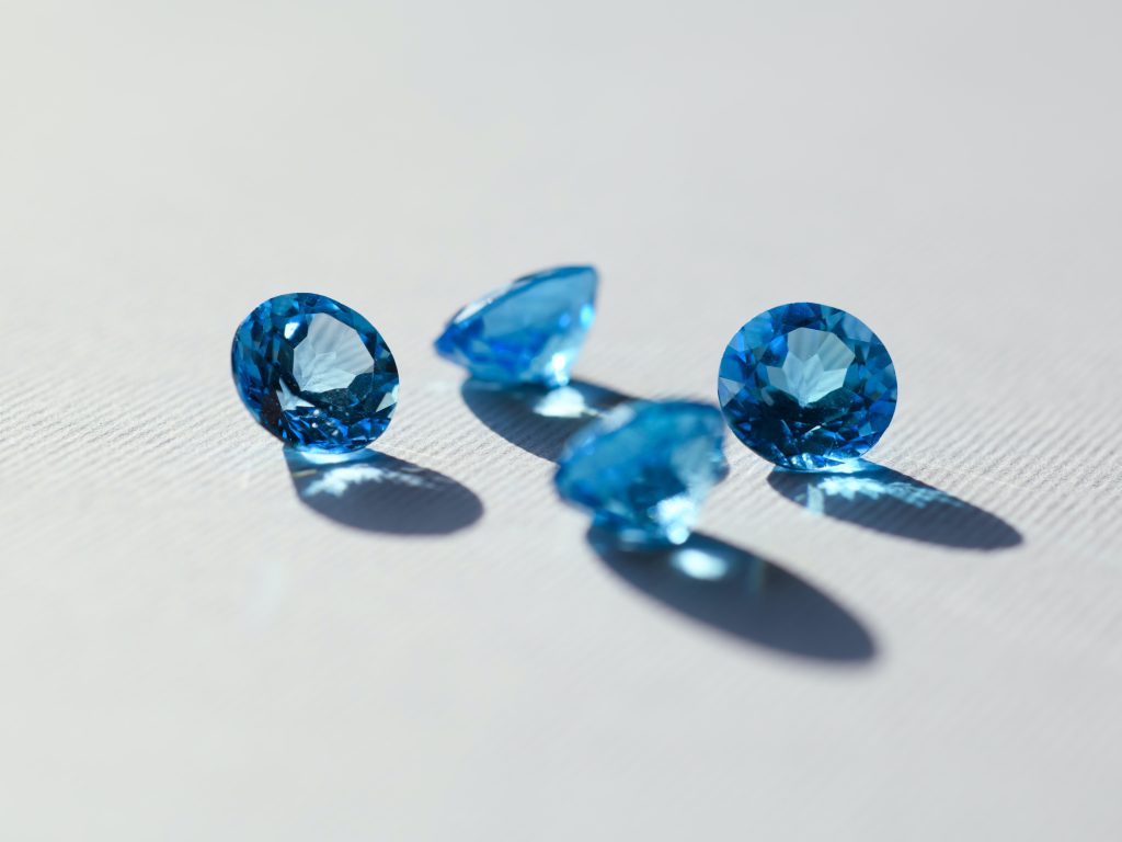 Image of sapphires on a beige background