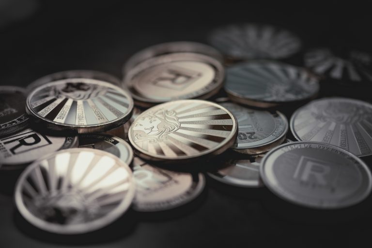 Image of mint coins on a black background