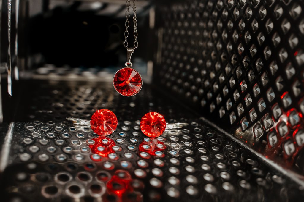 Image of rubies against a metal background