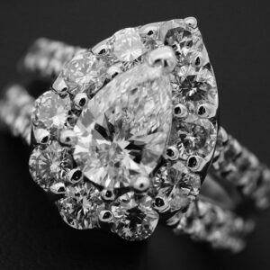 Large stoned diamond engagement ring against black background