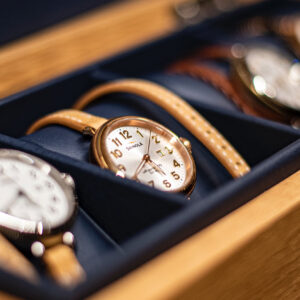 Image of watches inside of a watch drawer, estate watch. We buy watches.